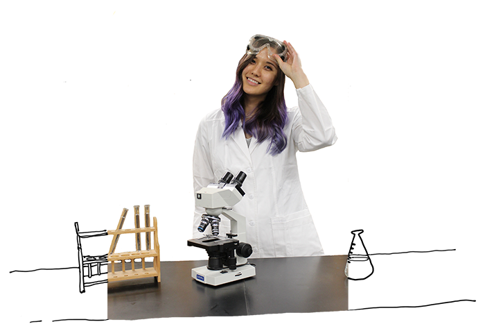 Photo of Kelly in a science lab outfit.